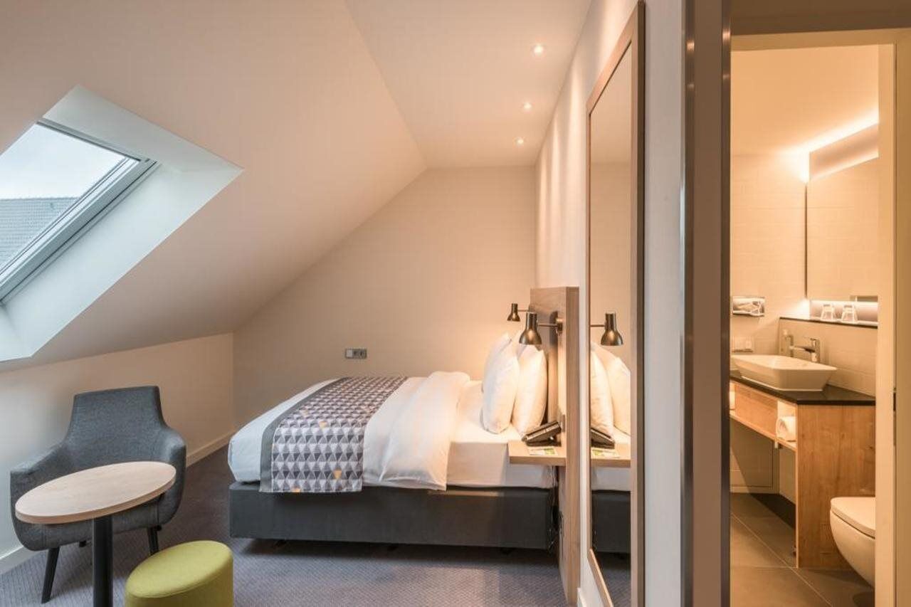 Отель - Munich Airport, An Ihg 4*